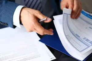 Car accident lawyer reading documents