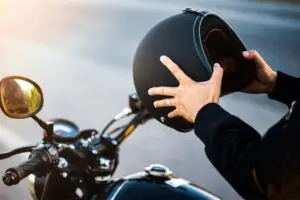 Biker on with a black helmet