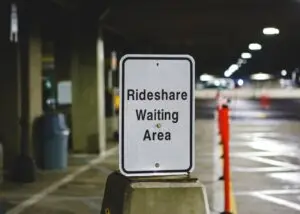 Sign that says rideshare waiting area at the airport