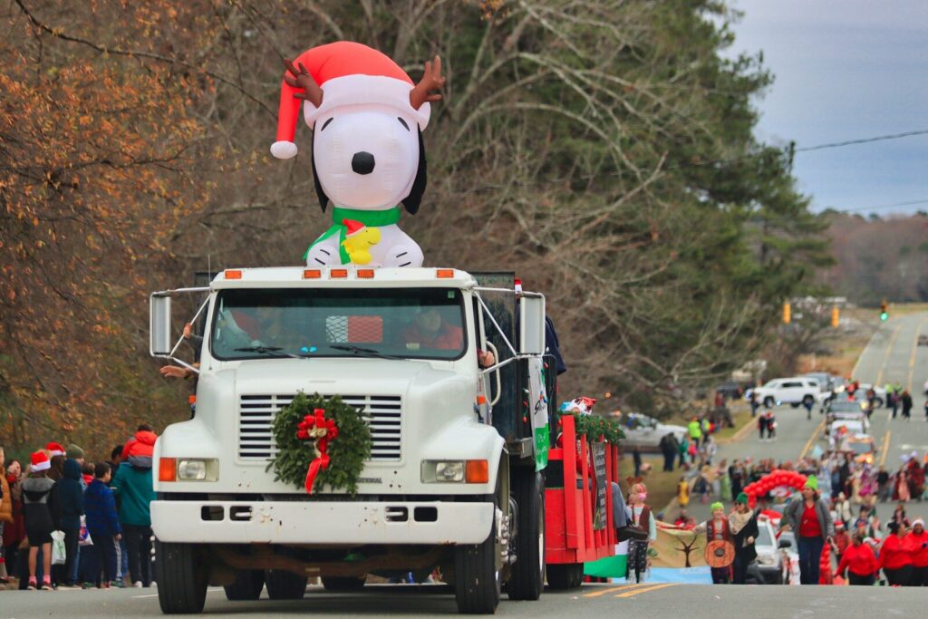santa claus figurine on white truck
